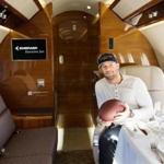 New England Patriots wide receiver Julian Edelman relaxes on a Magellan Jet. 